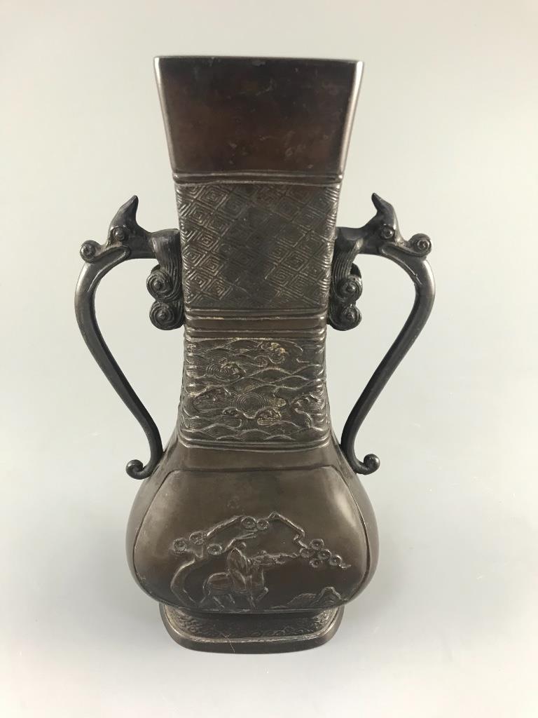 A Chinese bronze two handled flower vase, Ming dynasty, 24.5cm